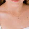 cross-necklace-in-pearl-863402