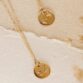 zodiac-necklace-styled-3_201b8c17-b8ab-4983-b477-8e076ee487e3